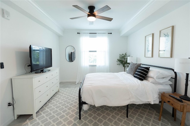 bedroom with ceiling fan and ornamental molding