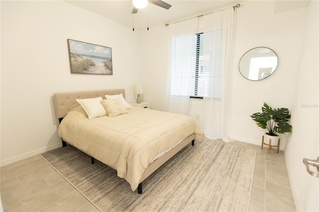 tiled bedroom with ceiling fan