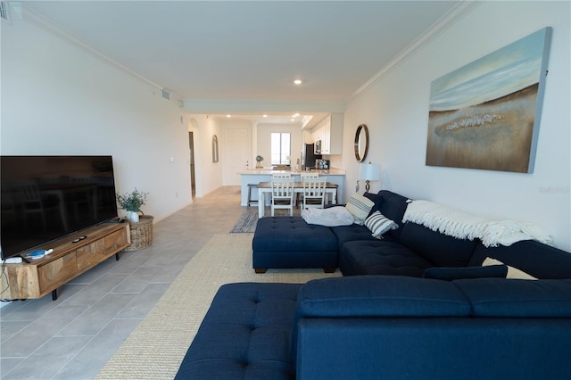 tiled living room with crown molding