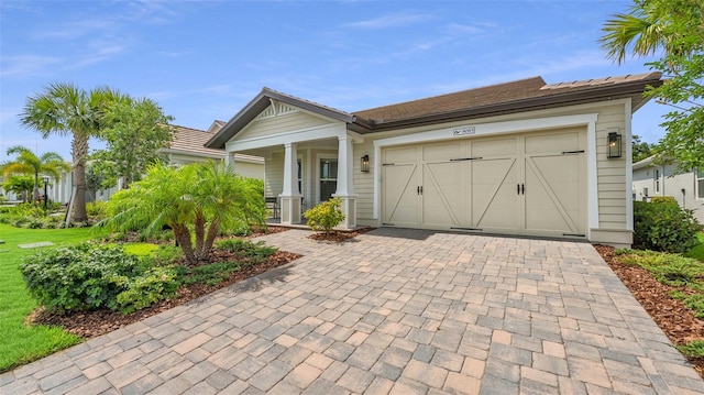 ranch-style home featuring a garage