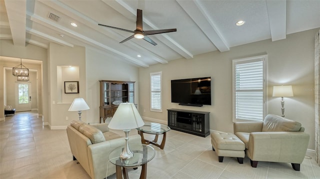 living room with ceiling fan with notable chandelier, light tile floors, and vaulted ceiling with beams