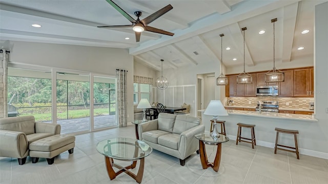 tiled living room with ceiling fan with notable chandelier, high vaulted ceiling, and beamed ceiling