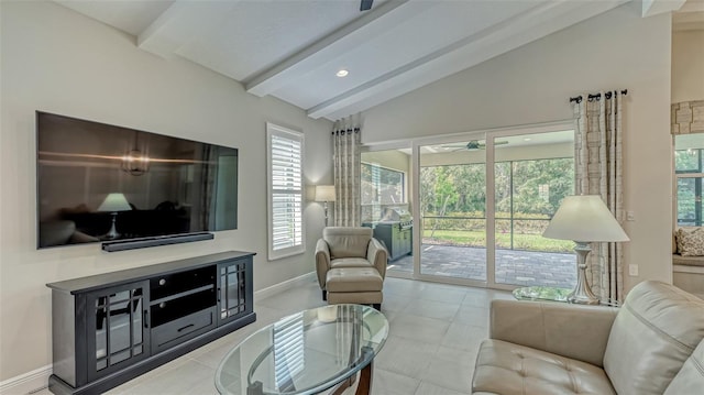 living room with vaulted ceiling with beams and light tile floors