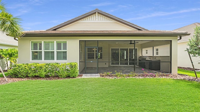 exterior space with a patio, a yard, and ceiling fan