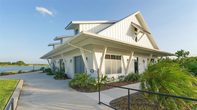 view of front facade with a water view