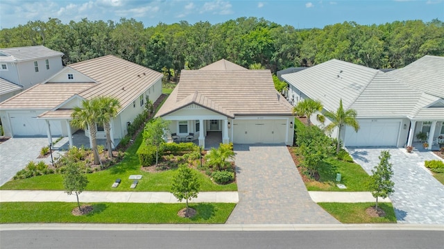 view of front of property with a garage