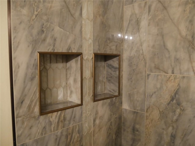 interior details featuring walk in shower