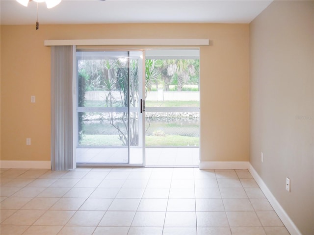 empty room with light tile patterned floors