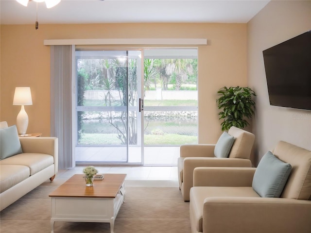 living room featuring light tile patterned flooring and a wealth of natural light