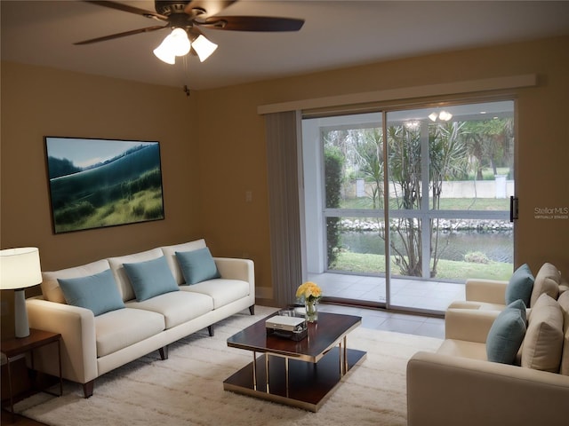 living room with ceiling fan