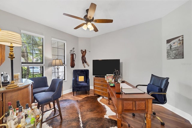 office area with hardwood / wood-style floors, ceiling fan, and plenty of natural light