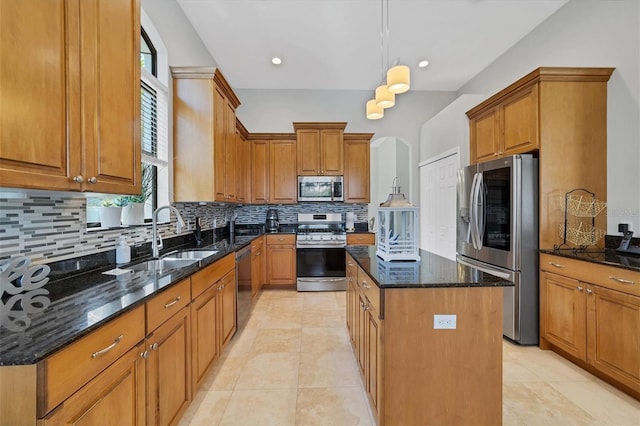 kitchen featuring backsplash, appliances with stainless steel finishes, dark stone counters, and light tile floors