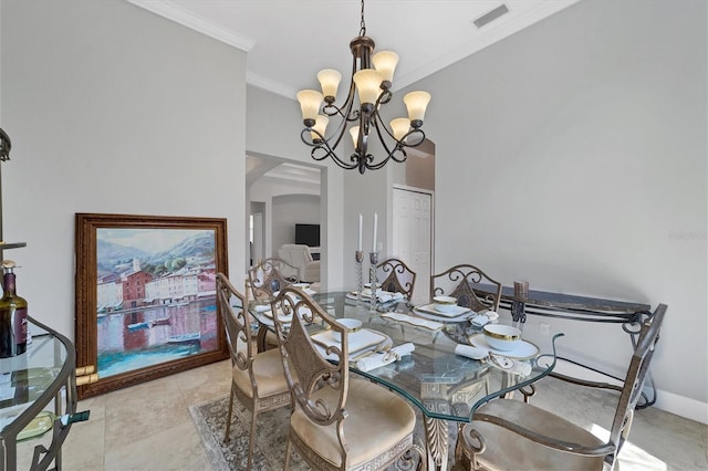 dining area with crown molding, light tile flooring, and a chandelier