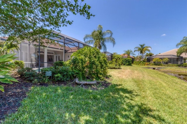 view of yard featuring a lanai