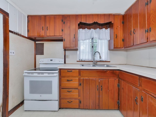 kitchen with sink and electric range