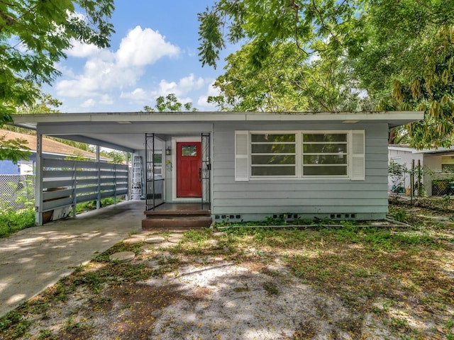 view of front of house with a carport