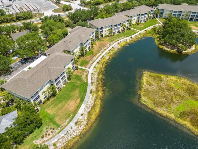 drone / aerial view featuring a water view