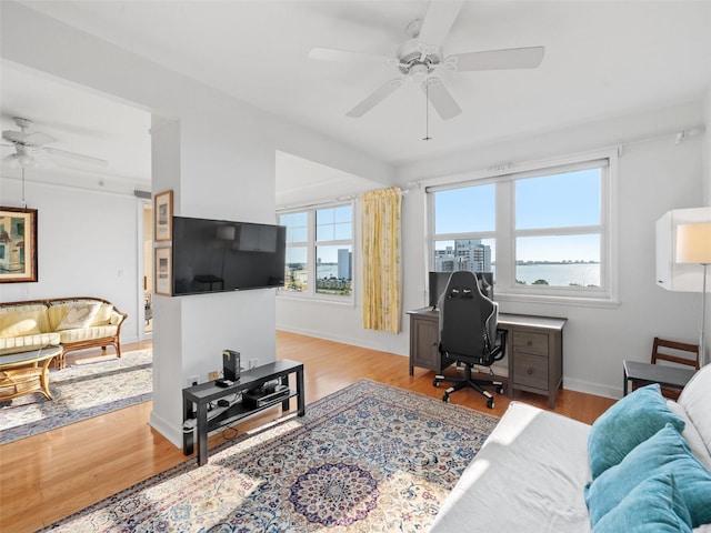 office area featuring hardwood / wood-style floors and ceiling fan