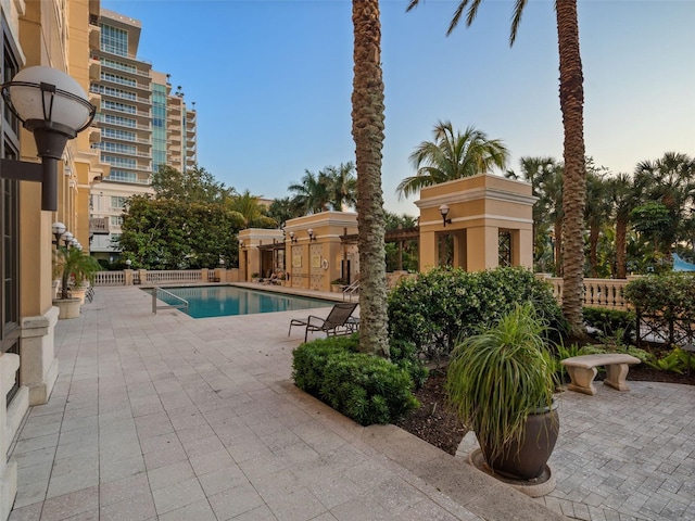 view of pool featuring a patio