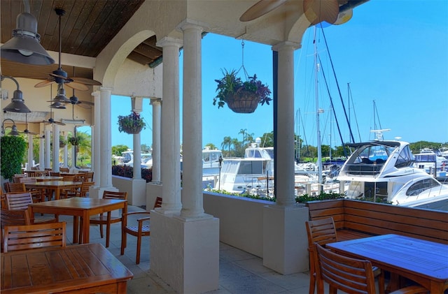 exterior space featuring ceiling fan