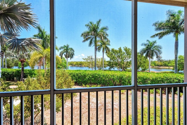 exterior space with plenty of natural light and a water view