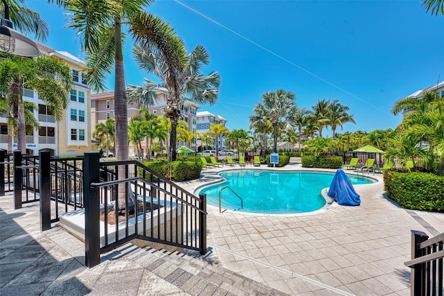 view of swimming pool featuring a patio