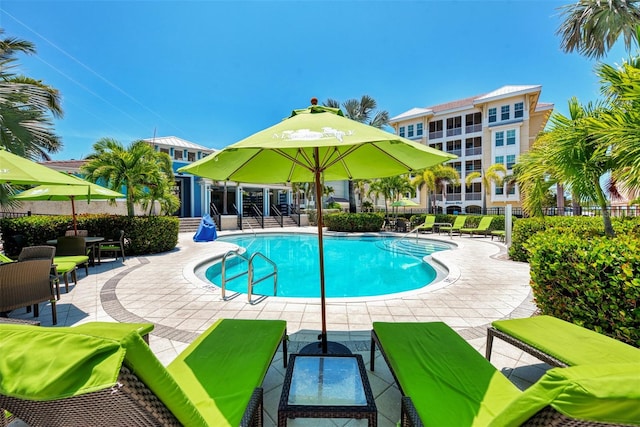 view of swimming pool featuring a patio