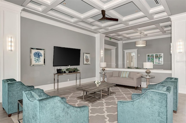 living room featuring beam ceiling, ceiling fan, and coffered ceiling