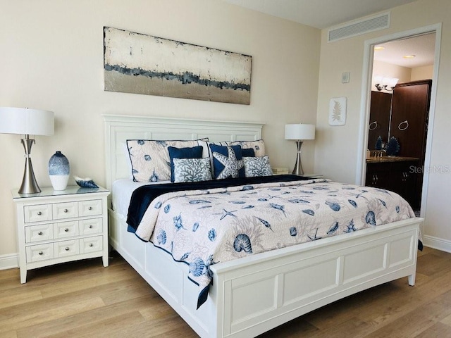 bedroom featuring light hardwood / wood-style flooring