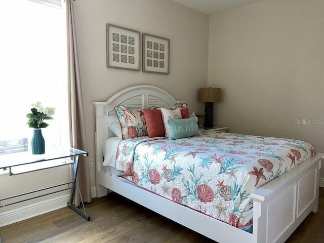 bedroom featuring hardwood / wood-style flooring