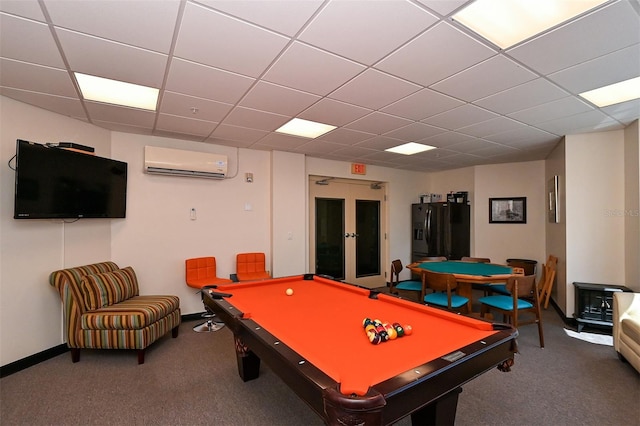 recreation room with carpet floors, a drop ceiling, a wall mounted AC, and billiards