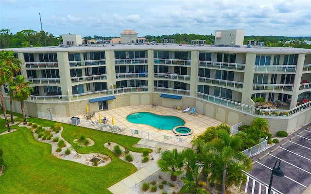 view of swimming pool with a patio area