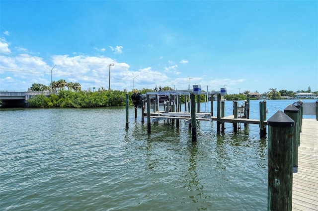 view of dock with a water view