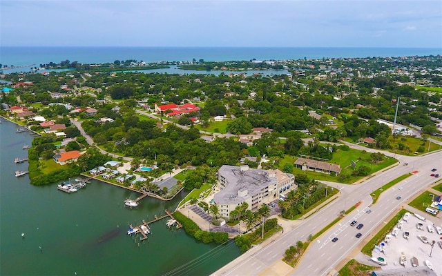 drone / aerial view featuring a water view