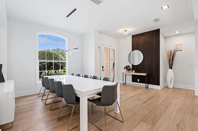 dining space featuring light hardwood / wood-style floors