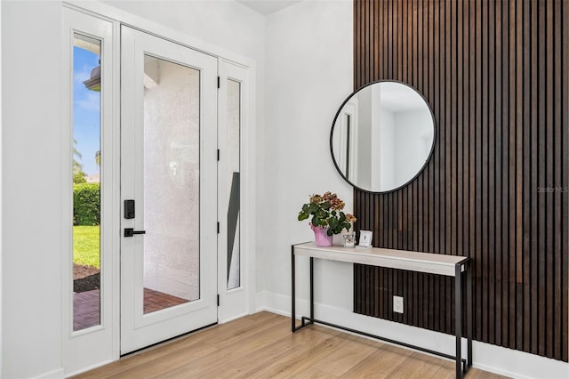 foyer with light wood-type flooring