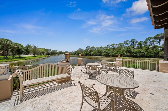 view of patio featuring a water view