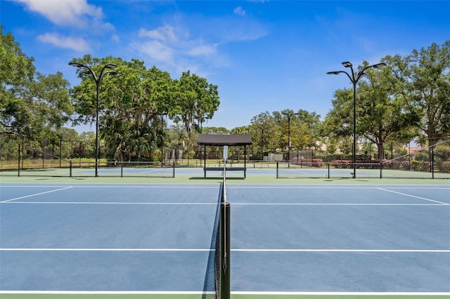 view of sport court with fence and community basketball court