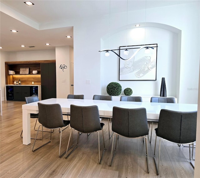 dining area with recessed lighting and light wood-type flooring