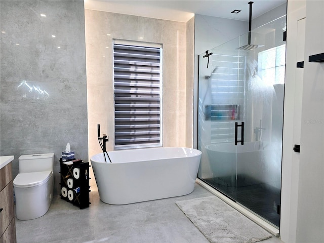 bathroom with a shower stall, a soaking tub, finished concrete flooring, and toilet