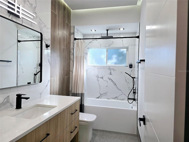 bathroom featuring shower / bath combo with shower curtain, toilet, and vanity