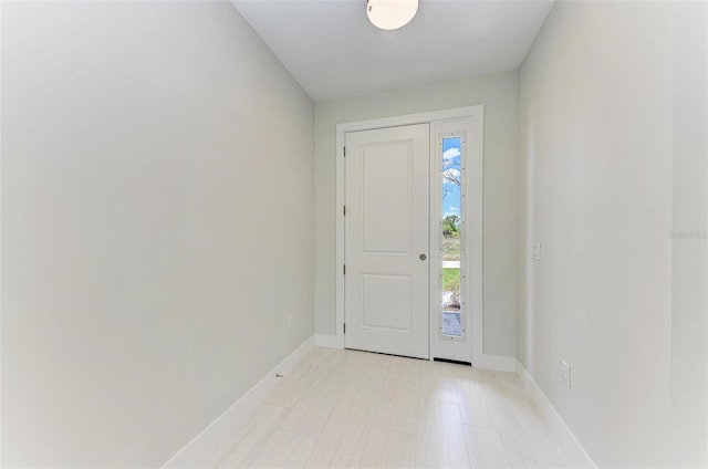 entryway with light tile floors