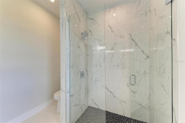 bathroom with a shower with shower door, toilet, and tile flooring