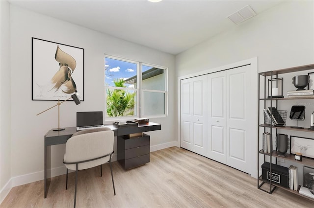 office space featuring light hardwood / wood-style flooring