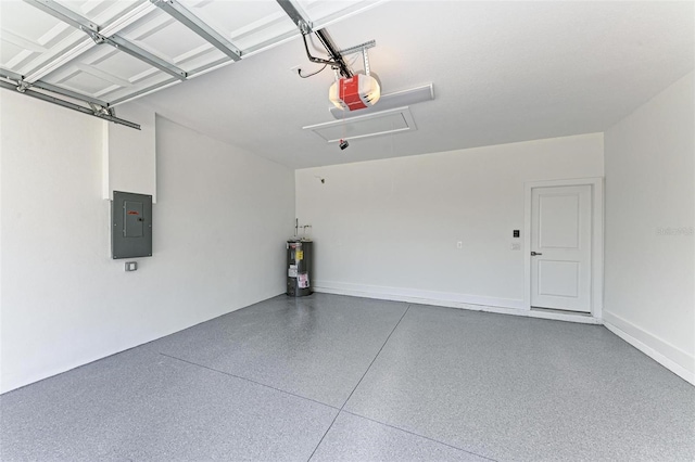 garage with a garage door opener and electric water heater