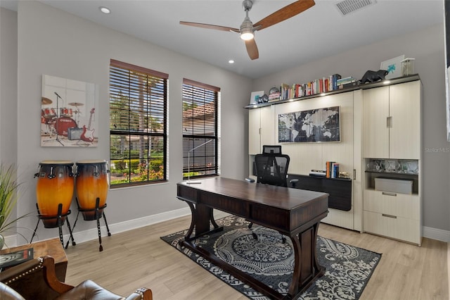 office area featuring light wood-type flooring and ceiling fan