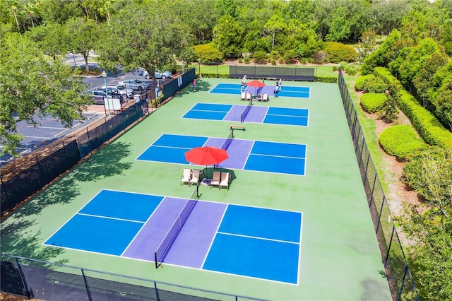 view of sport court featuring basketball hoop