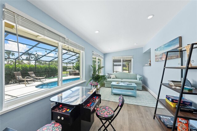 sunroom with vaulted ceiling