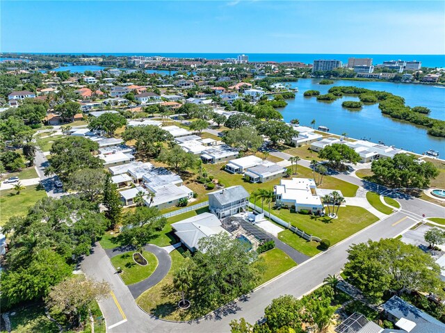 aerial view with a water view and a residential view