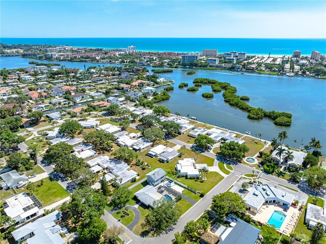 bird's eye view with a water view and a residential view